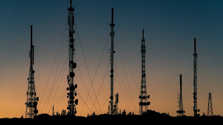 Telecommunication towers at sunset